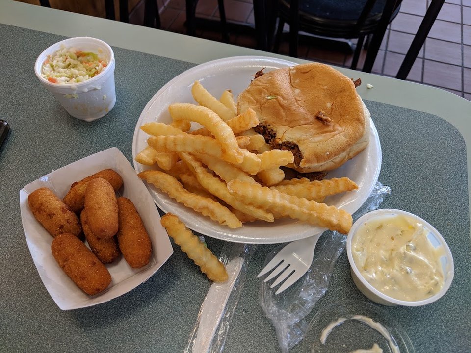 Hot dog and fries on a diner tray.